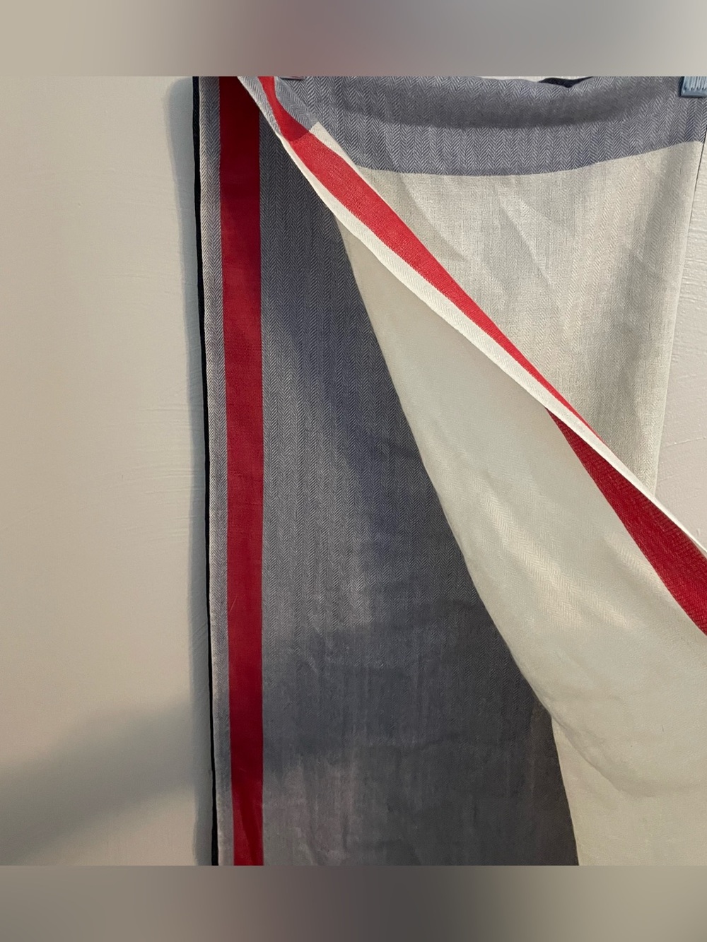 Wool silk blend scarf with red, black, off white and grey color block.